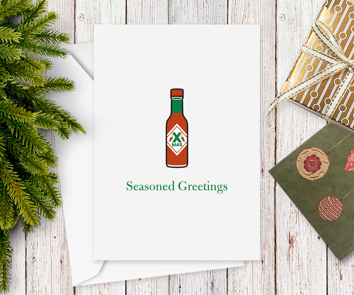 "Seasoned Greetings" holiday card with hot sauce bottle